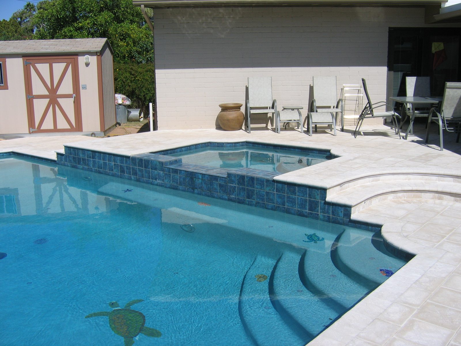 Pool Deck Remodel with Curved Spa Step in Phoenix Valley, AZ, Stone Creations paver project photo 2