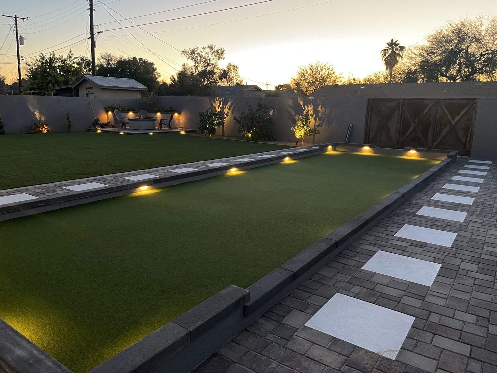 Lit Stepping Pads Through Turf
