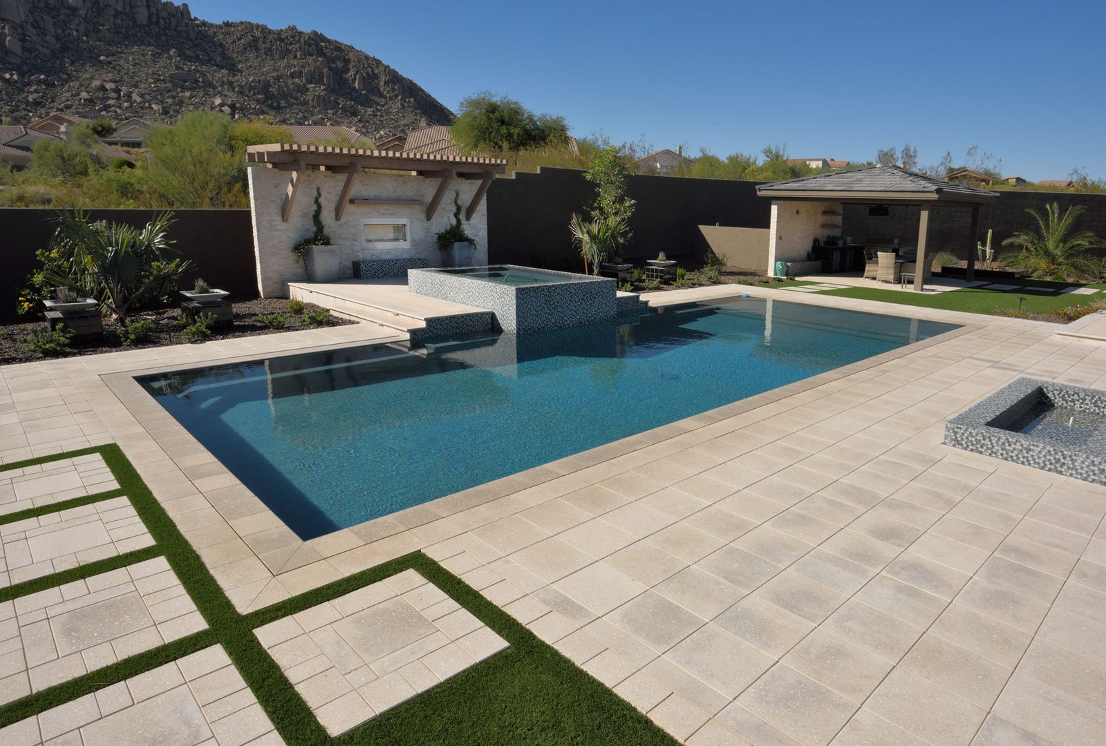 Pool Deck with Turf Strip Inlays